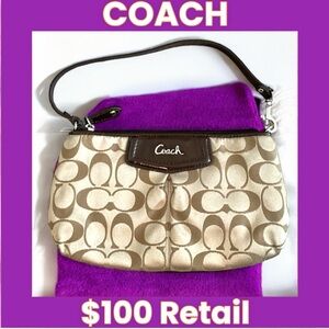 LIKE NEW Coach signature large wristlet.  Perfect condition!